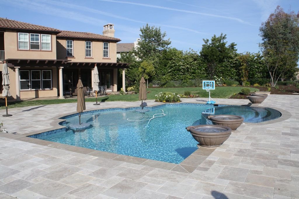Best Swimming Pool Deck Tiles: Enhancing Your Poolside Oasis