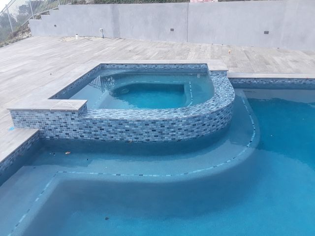 Unleashing Elegance: A Guide to Modern Swimming Pool Tiles in 2024